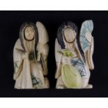 Two 19th Century Japanese carved and inked ivory netsuke with changing faces, H. 5cm.