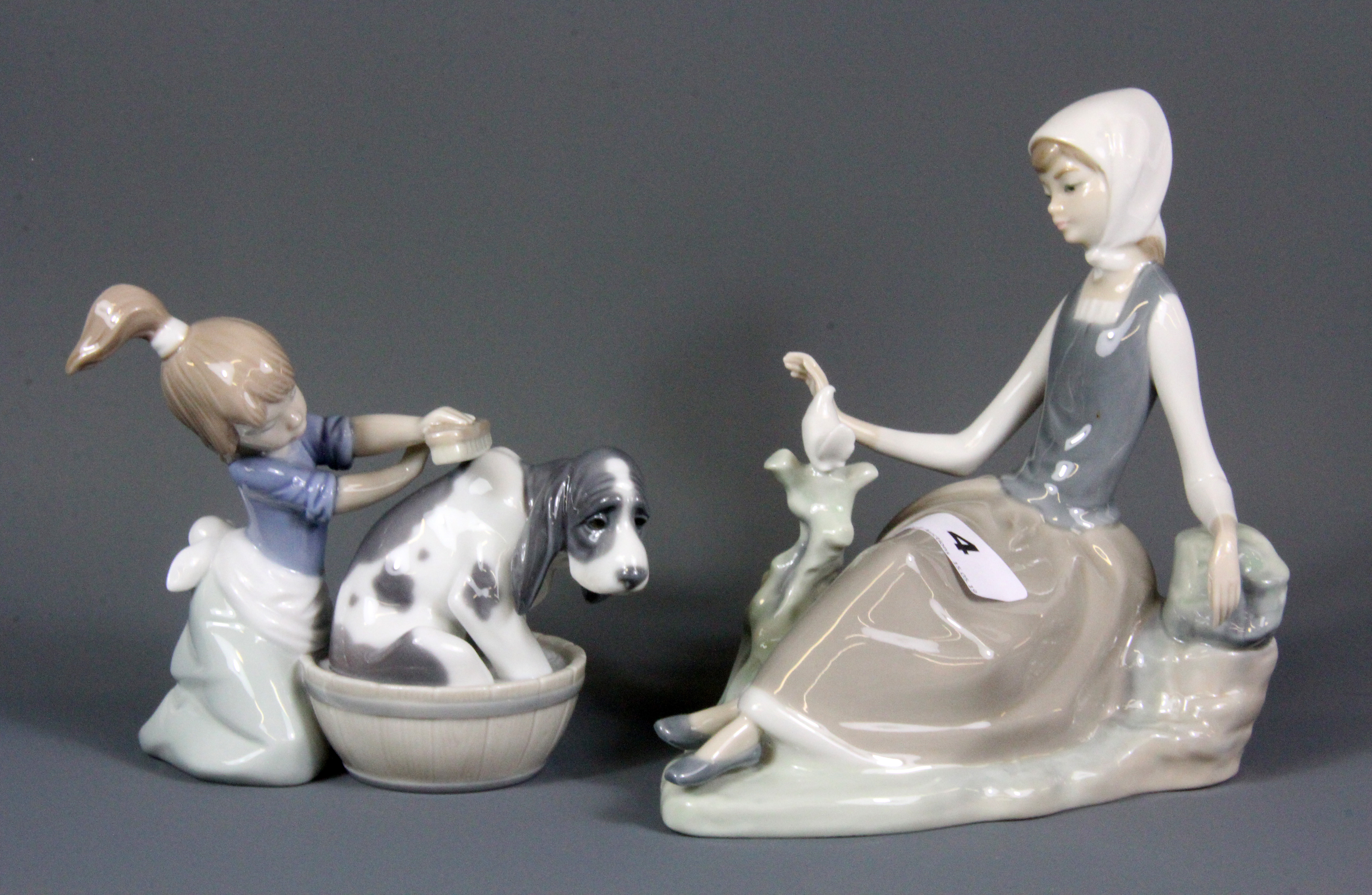 Two Lladro figures, Lladro collector's plaque and candleholder with three Lladro dishes, (with - Image 2 of 4