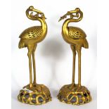 A pair of Chinese gilt bronze crane censers, H. 27cm.
