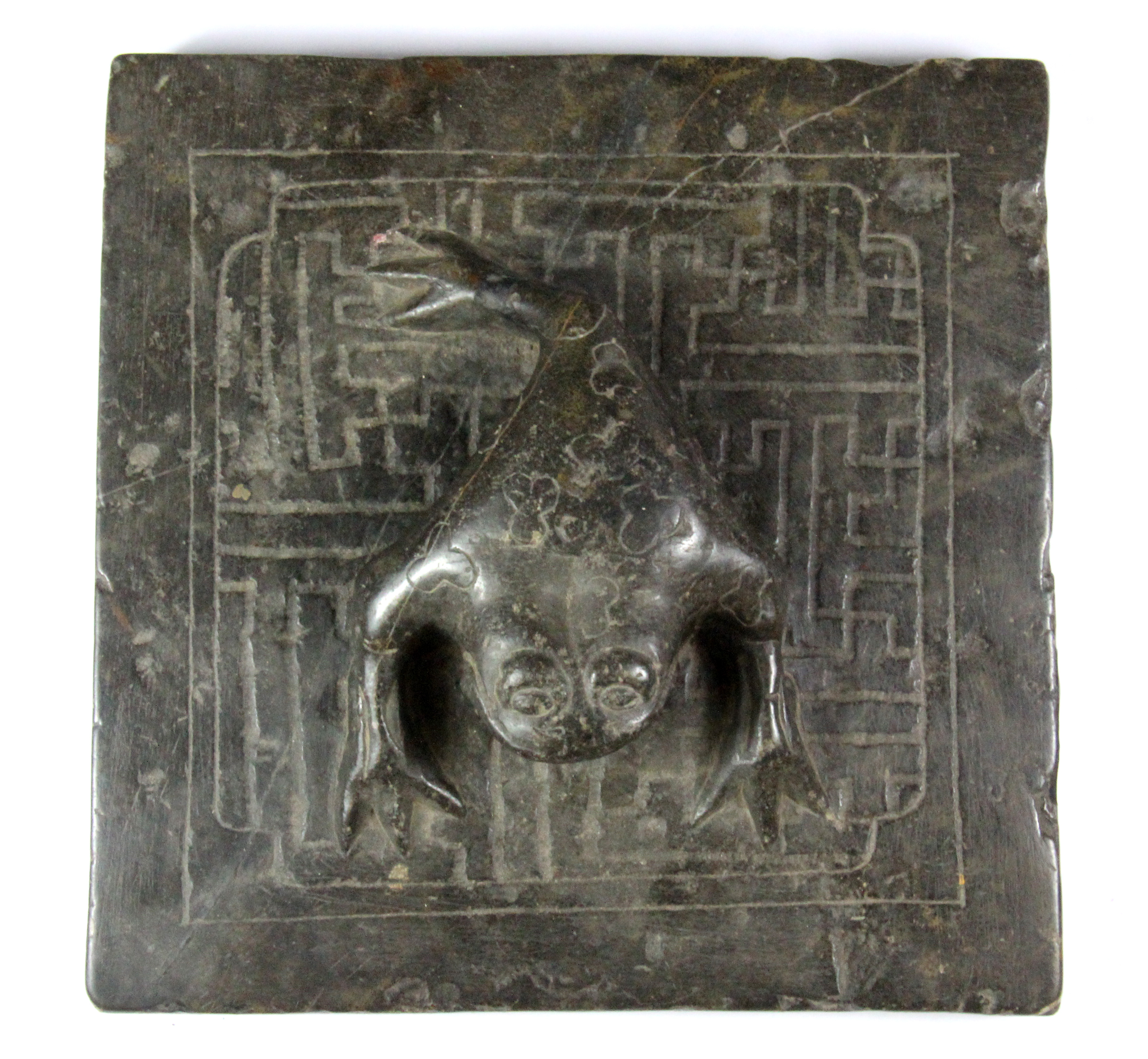 A Chinese Ming dynasty carved stone paper press, 23 x 24 x 7cm. - Image 2 of 2