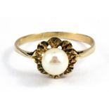 A 9ct yellow gold (worn stamp 9ct) pearl set ring, (W).