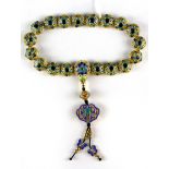 A lovely strand of Tibetan enamelled and gilt metal prayer beads, bead Dia. 1.5cm folded L. 21cm.