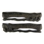 A pair of Chinese carved hardwood scroll weights, L. 27cm.