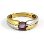 A 9ct yellow and white gold amethyst set ring, (N.5).