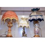 Three porcelain table lamps and shades, tallest H. 80cm.