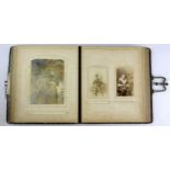 A 19th Century leather covered photograph album, 21 x 23 x 6cm.