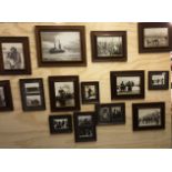 A group of fourteen framed reproduction sepia photographs by Frank Meadow Sutcliffe of Whitby with