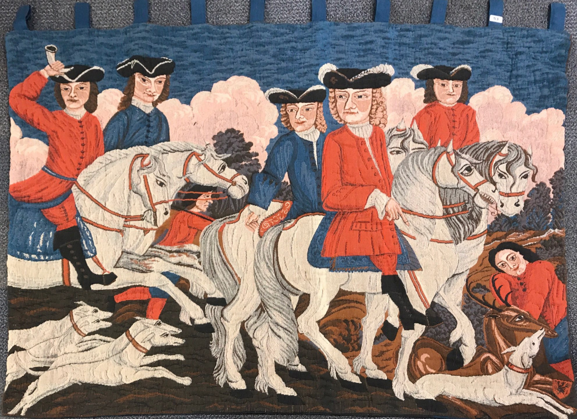 A large heavily padded wall tapestry, W. 170cm.