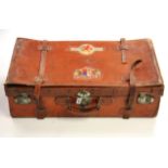 A large vintage leather suitcase, size 75 x 43 x 22cm.