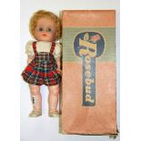 A vintage boxed Rosebud doll.