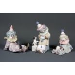 Three Lladro clown figures, tallest H. 15cm, (with boxes).