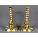 A pair of 19th Century Welsh hammered brass chapel candlesticks, H. 26cm.