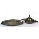 A pewter platter with a pewter dish and cover, W. 33cm.