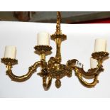 A five branch brass light fitting, H. 56cm.