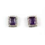 A pair of 925 silver amethyst and white stone set cluster earrings, L. 1.2cm.