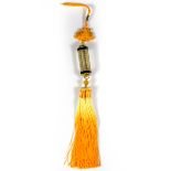 An interesting Chinese silk mounted and gilt decorated crystal tassel, overall L. 43cm.