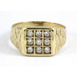 A gentleman's 9ct yellow gold stone set ring, (R.5).