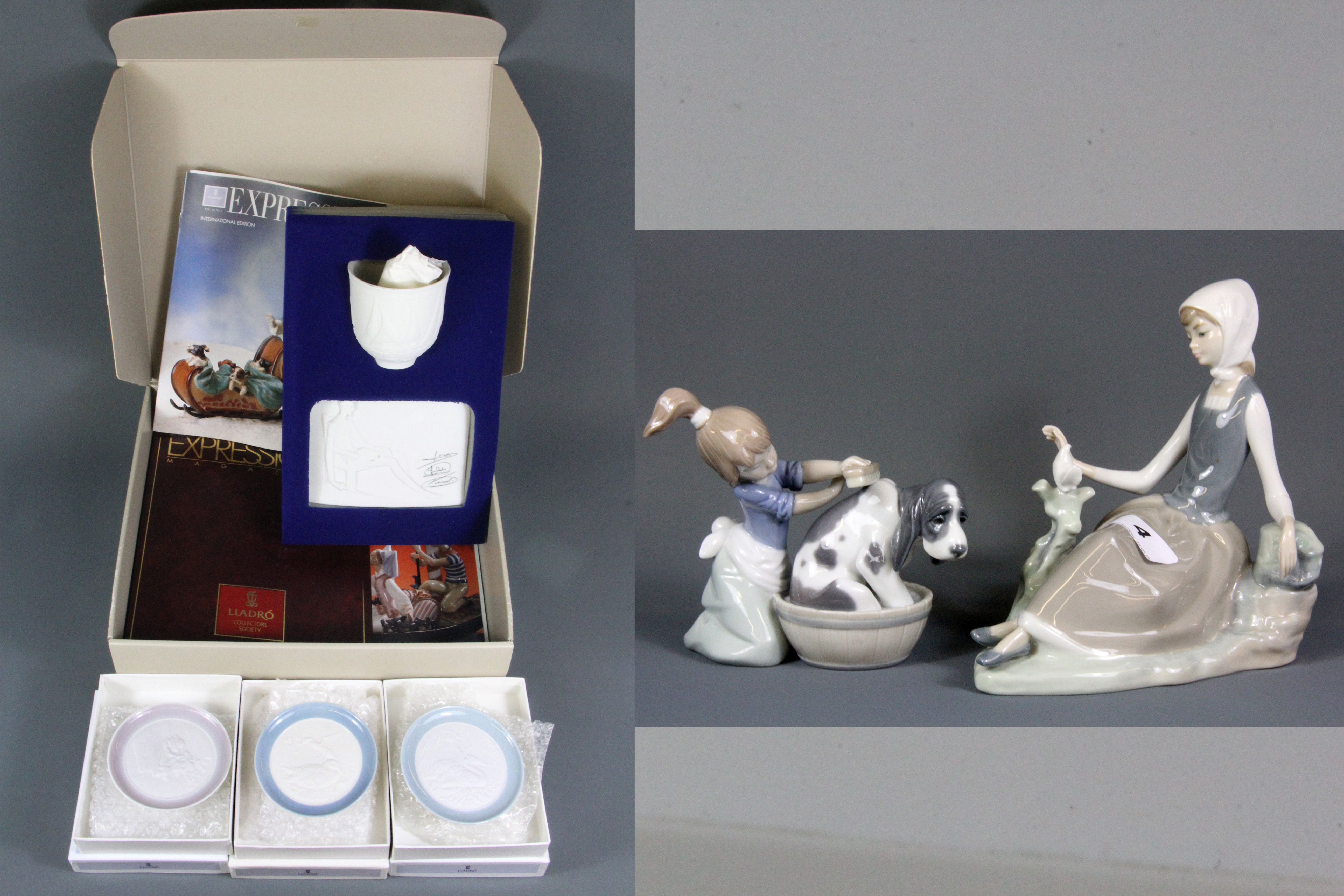 Two Lladro figures, Lladro collector's plaque and candleholder with three Lladro dishes, (with