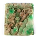 A Chinese carved soapstone panel of a fish in a lotus pond, size 8.5 x 9.5cm.