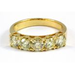 An 18ct yellow gold ring set with five brilliant cut fancy yellow diamonds, approx. 1.6ct, (N).