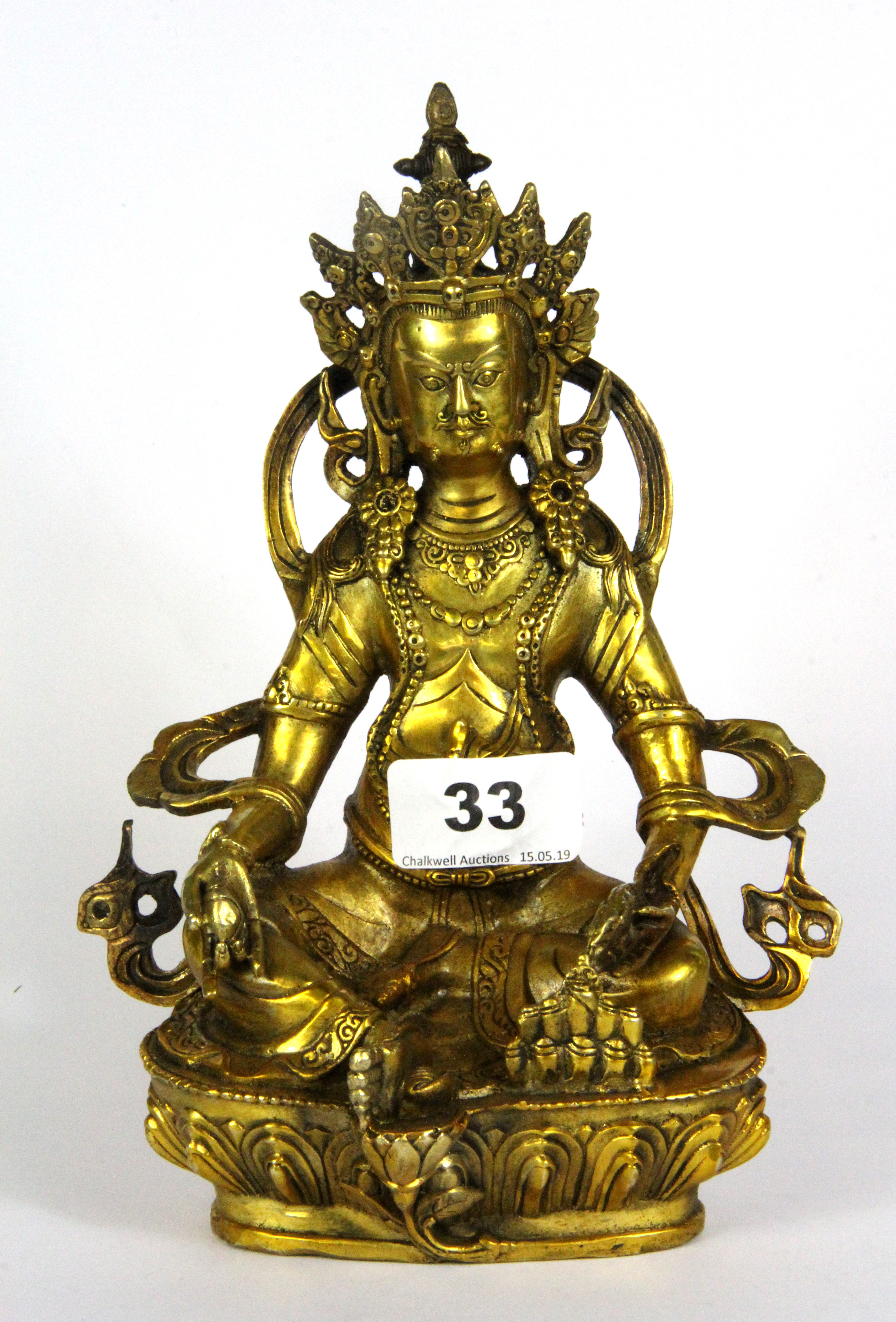 A Tibetan gilt bronze deity figure of Trisong Detsen (742 - 797 AD) 38th King of Tibet, H. 20cm.