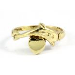 A 9ct yellow gold dolphin shaped ring, (K.5).