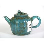 A small Chinese robin's egg glazed terracotta teapot, H. 8.5cm.