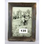 A hallmarked silver photograph frame, 12.5 x 17cm.