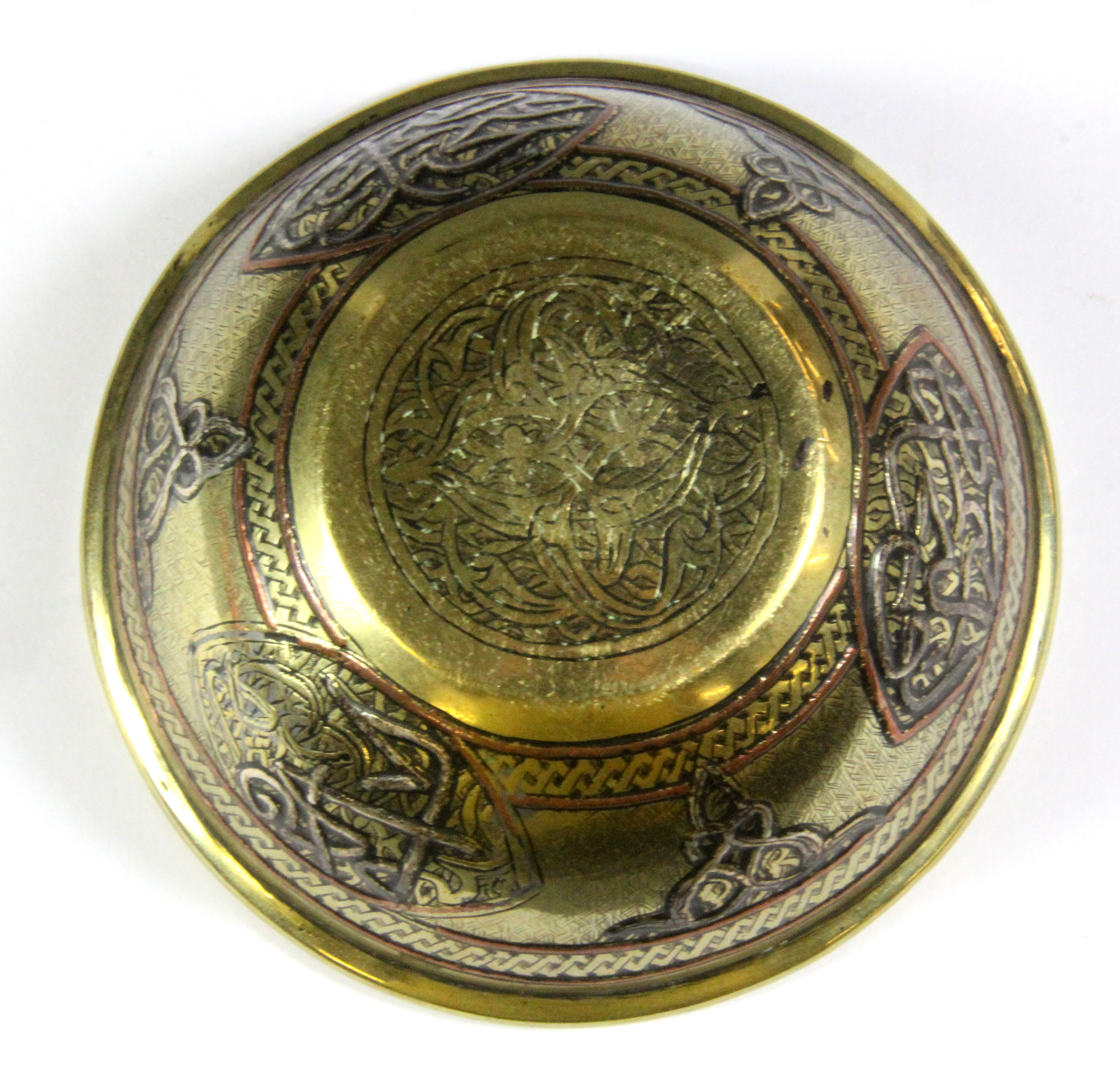 Islamic interest. A silver and copper decorated brass bowl, Dia. 12cm D. 4.5cm. - Image 2 of 2