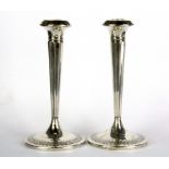 A pair of hallmarked silver Liberty candlesticks, H. 20cm.