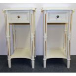 A pair of painted bedside cabinets.