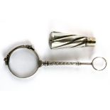 A 925 silver cane handle and a lorgnette.