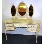 A vintage painted kidney shaped dressing table with plate glass top, W. 131cm.