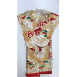 A superb heavily padded mid 20th century Japanese silk kimono, L. 186cm.
