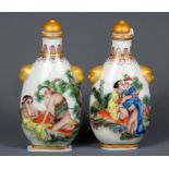 A pair of Chinese hand painted erotic porcelain snuff bottles, H. 11cm.
