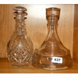 A heavy quality ship's decanter and a Georgian cut glass decanter, H. 23cm.