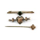 A hallmarked silver and gold brooch, a 9ct gold pearl set stick pin and a further yellow metal