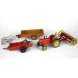 A Dinky 'Farm Tractor & Hay Rake' 27AK, a 'Massey-Harris Manure Spreader' 321 and a 'Harvest