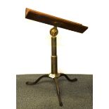 A 19th Century brass and oak telescope rest, H. 52cm.