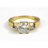 A 14ct yellow gold stone set ring, (L.5).