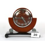 An Art Deco phenolic and chrome mantle clock in working order, H. 13.5cm.