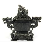 A Chinese carved black soapstone bowl and cover decorated with dragons, H. 19cm.