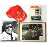 Motor racing interest. Four items autographed by Formula One racing champion Jackie Stewart and a