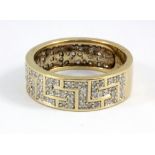 A gentleman's 9ct yellow gold Greek pattern ring set with brilliant cut diamonds, approx. 1ct