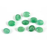 Ten unmounted oval cut emeralds, approx. 3.5ct, 5 x 4mm.