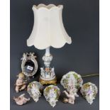 A group of cherub porcelain items including a gilt mounted table lamp (A/F), largest bracket H.