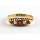 An 18ct yellow gold ring set with split pearls and rubies, c. 1902, Chester (O).