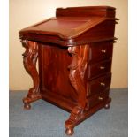 A reproduction mahogany Davenport desk, W. 55cm H. 85cm.