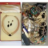 A box of costume jewellery.