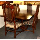 A superb large oak refectory table, size 121 x 242cm together with a set of eight Jacobean style